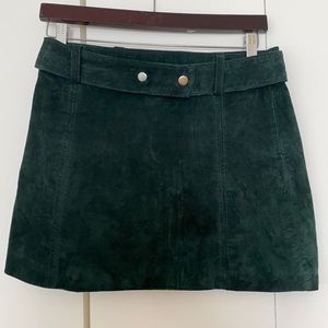 A green suede leather skirt
